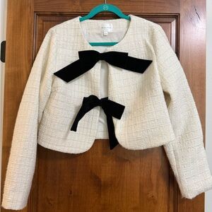 Elegant Cream Jacket with Black Accents